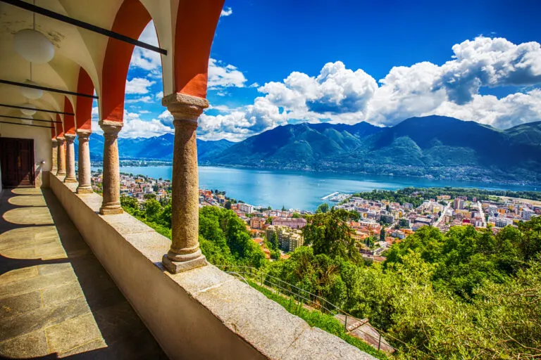 Beautiful view to Locarno city, lake Maggiore (Lago Maggiore) and Swiss Alps from Madonna del Sasso Church in Ticino, Switzerland.